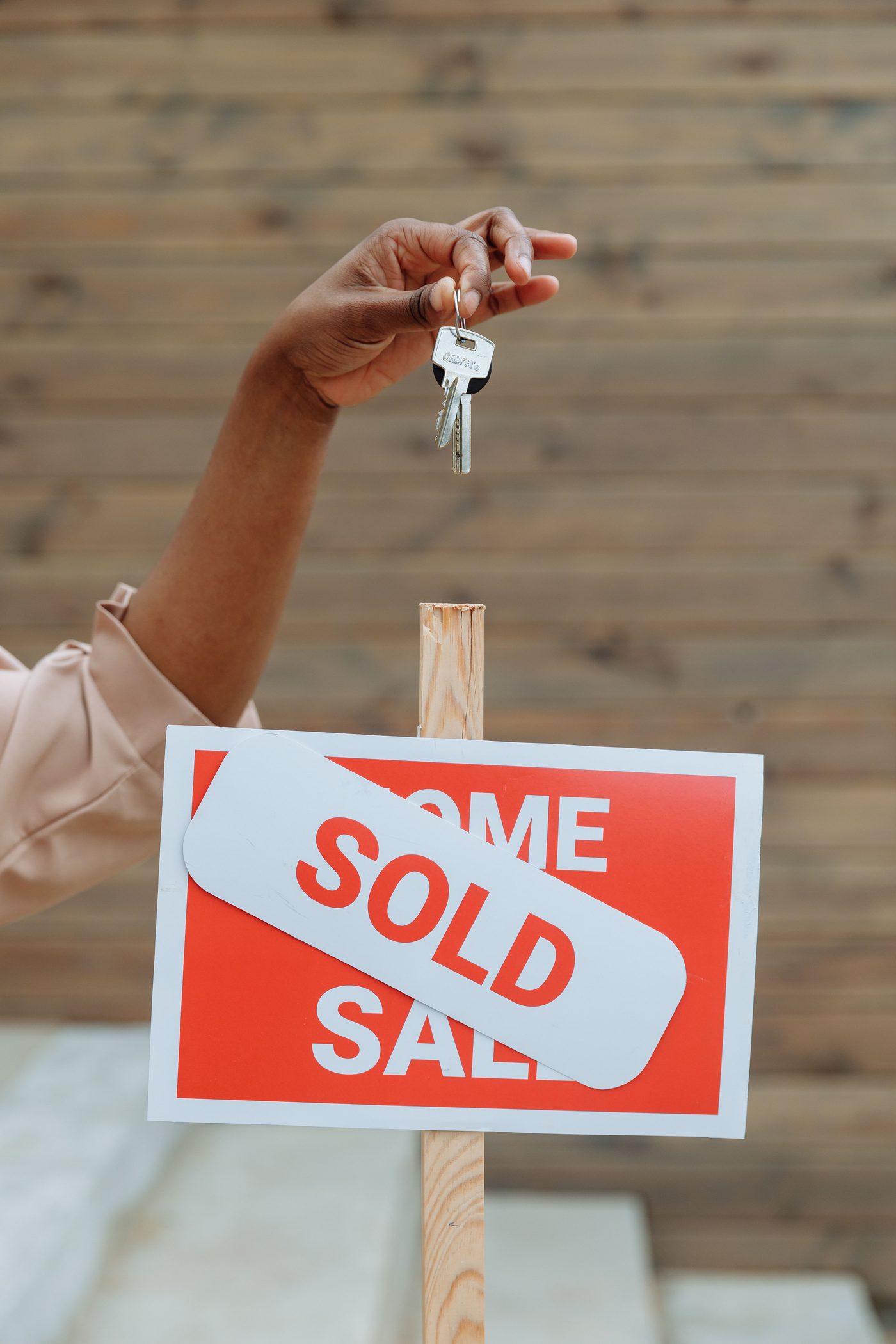 A "Home Sold" sign marking a successful sale